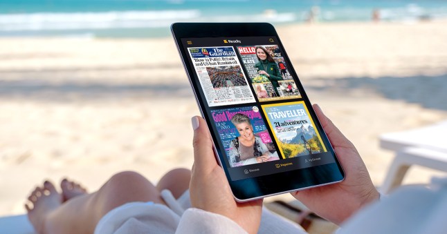 Person holding an electronic device and picking a novel to read.
