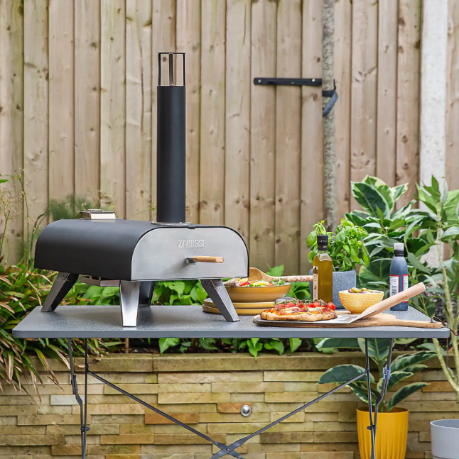 Zanussi Wood Pellet Pizza Oven with Paddle & Cover from Dunelm